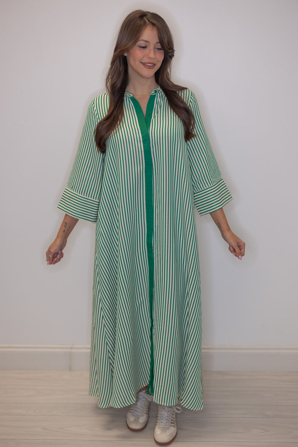 Women's striped green maxi dress by Entro, perfect for teachers