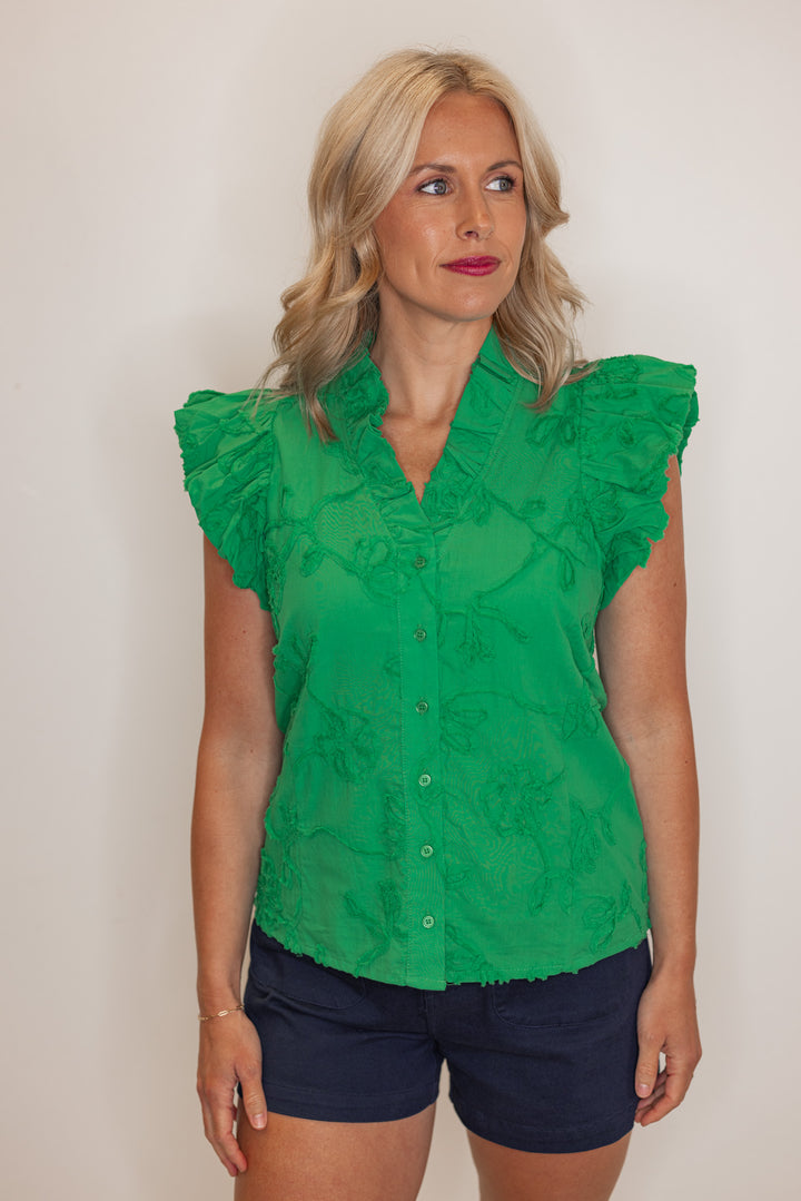 Women's green button top with green floral appliques throughout by Entro