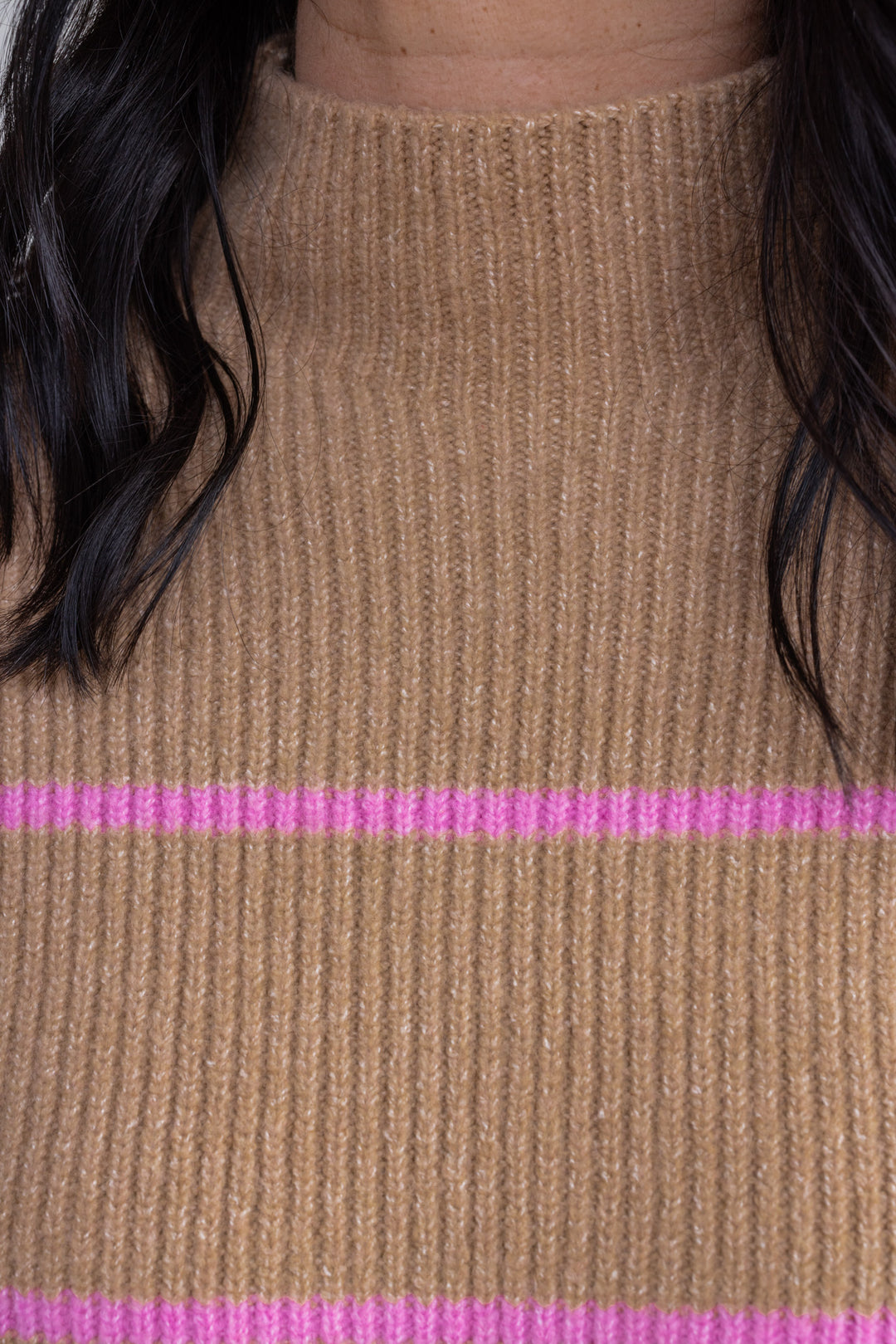 Women's taupe ribbed knit sweater with pink stripes by Wishlist showing ribbed knit fabric