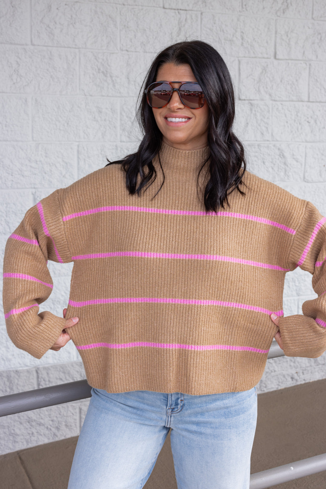 Women's taupe ribbed knit sweater with pink stripes by Wishlist showing true to size fit