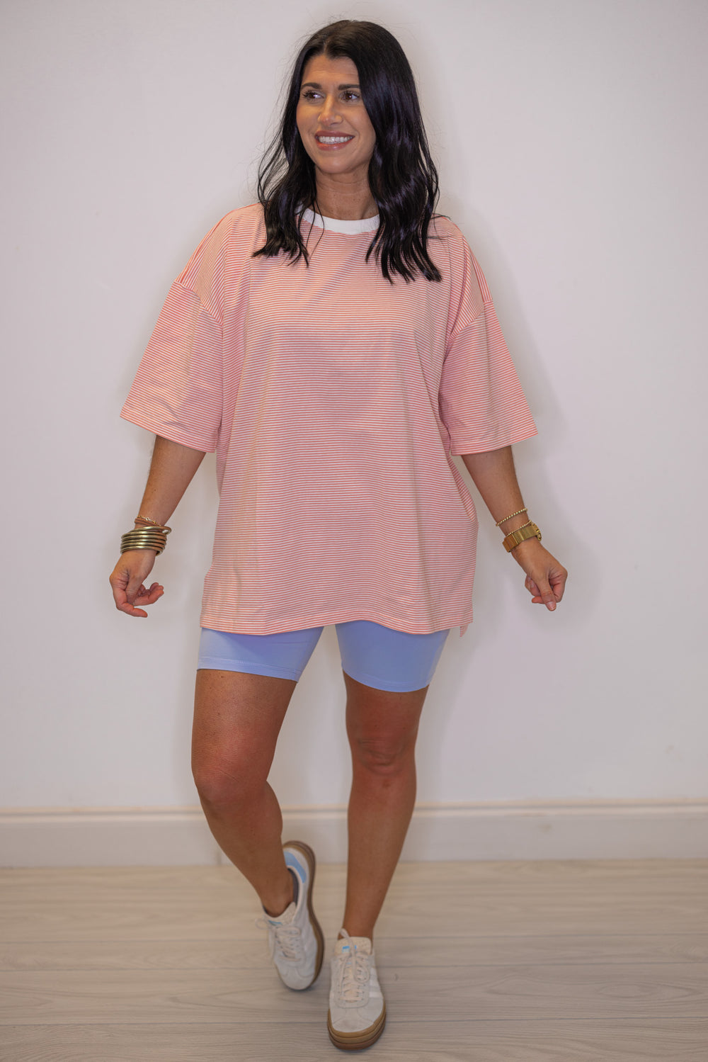 Women's coral and white striped knit oversized top, perfect for women of all ages