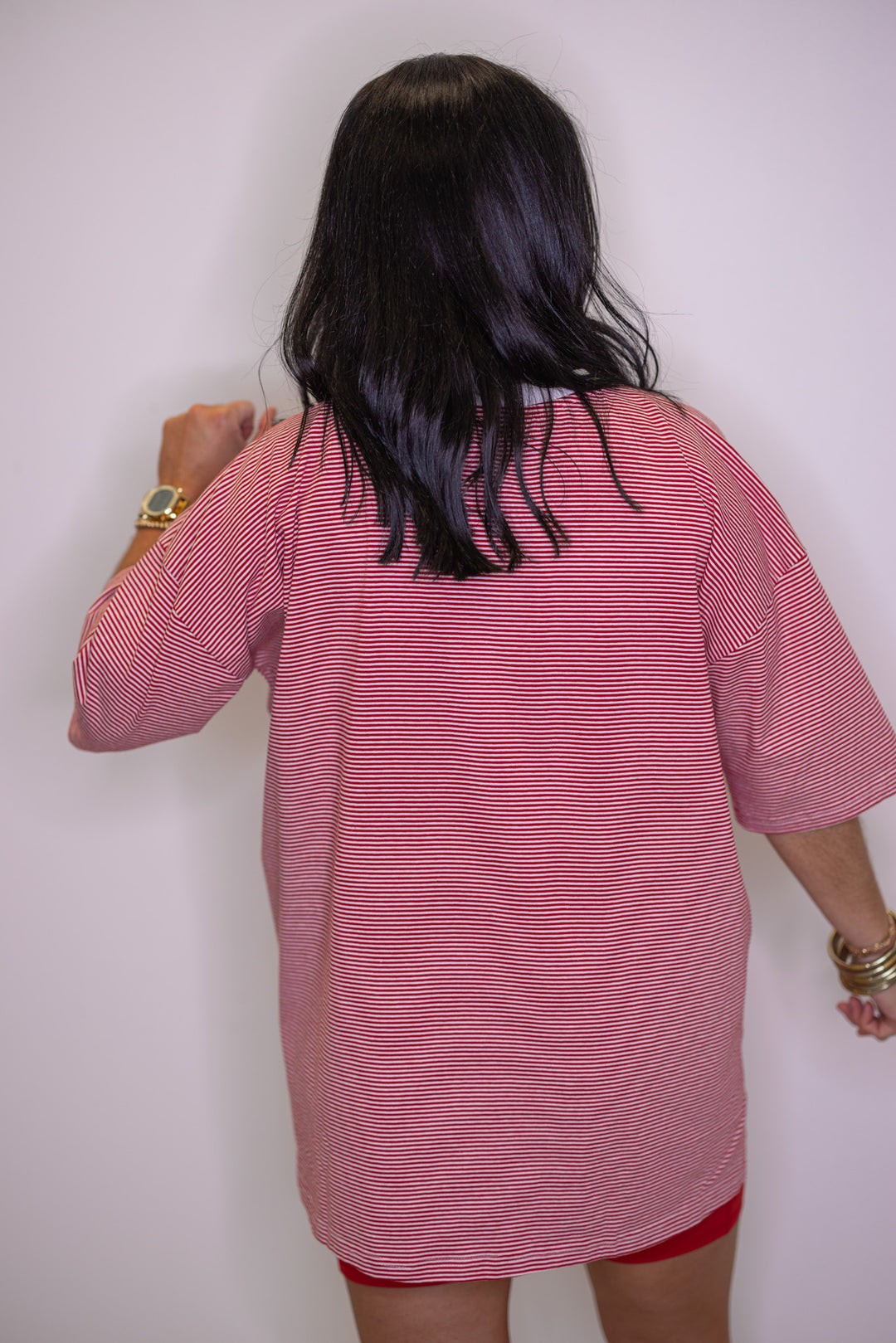 Women's red and white striped knit oversized top by Wishlist showing up close back view