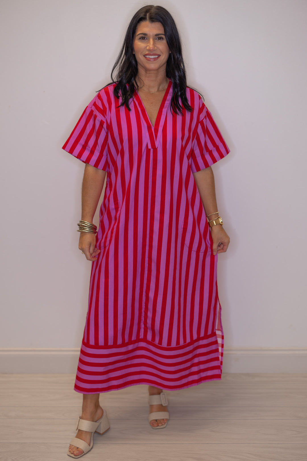 Women's red and pink striped midi dress by Entro, perfect for Valentine's Day