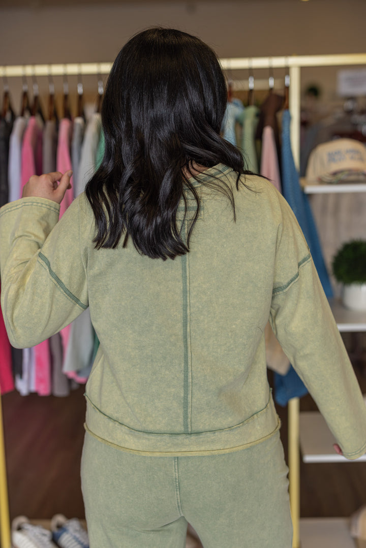 Women's mineral washed sage green knit wide leg pants and long sleeve top set by Very J showing up close back view of top