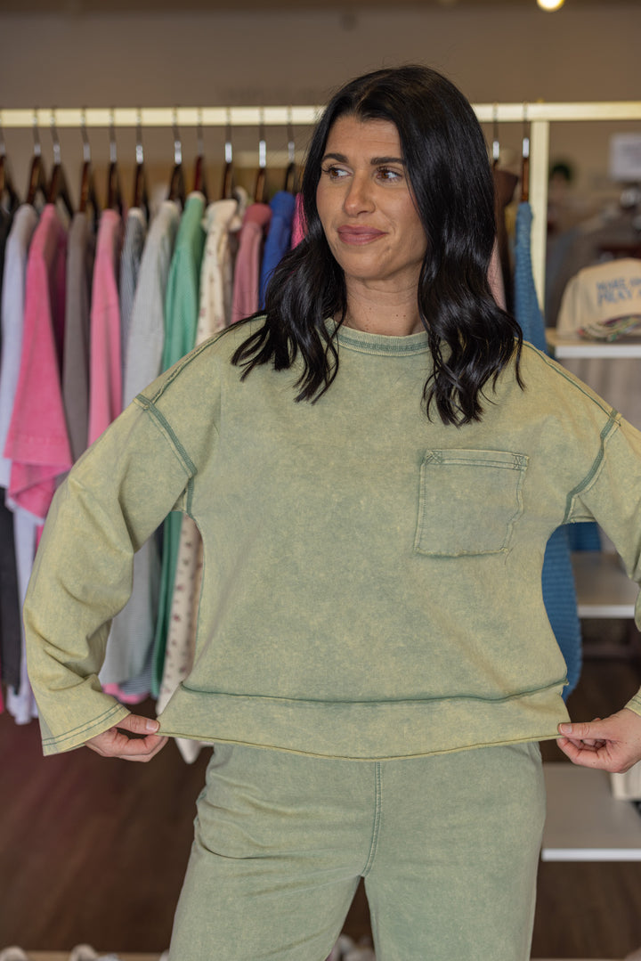 Women's mineral washed sage green knit wide leg pants and long sleeve top set by Very J showing relaxed fit of top