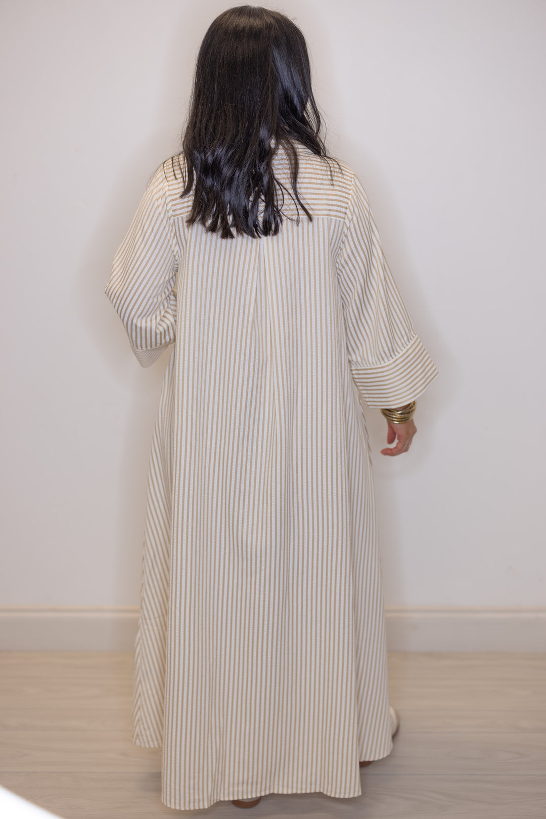 Women's striped light beige maxi dress by Entro showing full back view