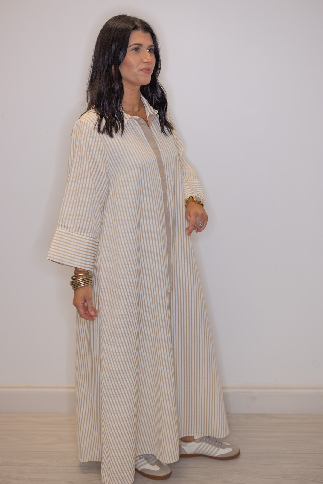 Women's striped light beige maxi dress by Entro, perfect for women of all ages
