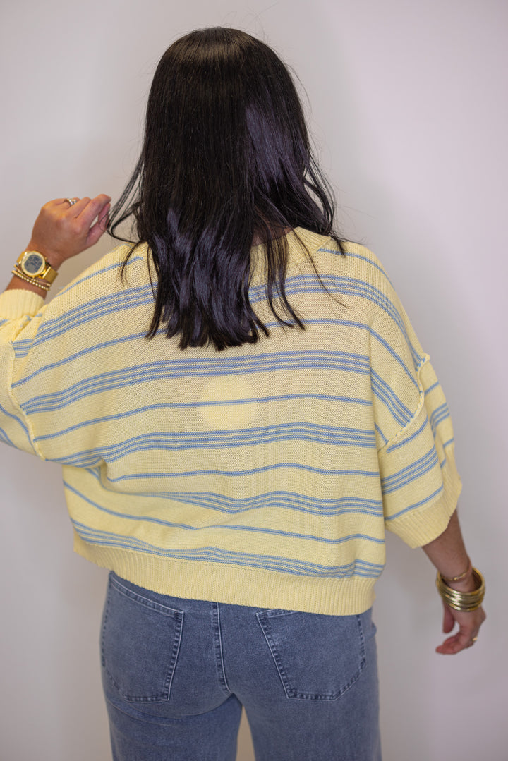 Women's lemon yellow sweater knit top with light blue stripes, great for spring break vacations