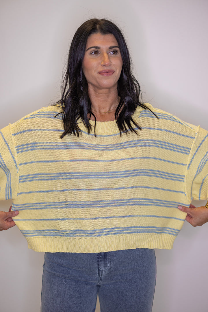 Women's boxy yellow sweater top with light blue stripes
