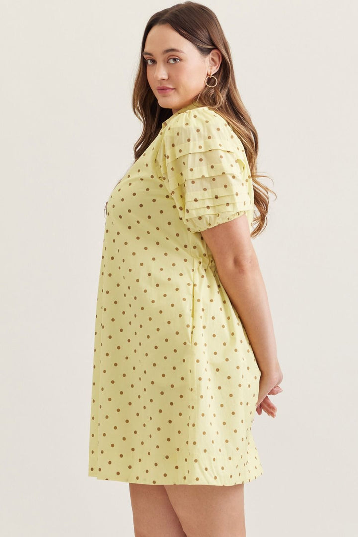 Entro lemon drop yellow plus size dress with brown polka dot print and cinch waist for a flattering silhouette