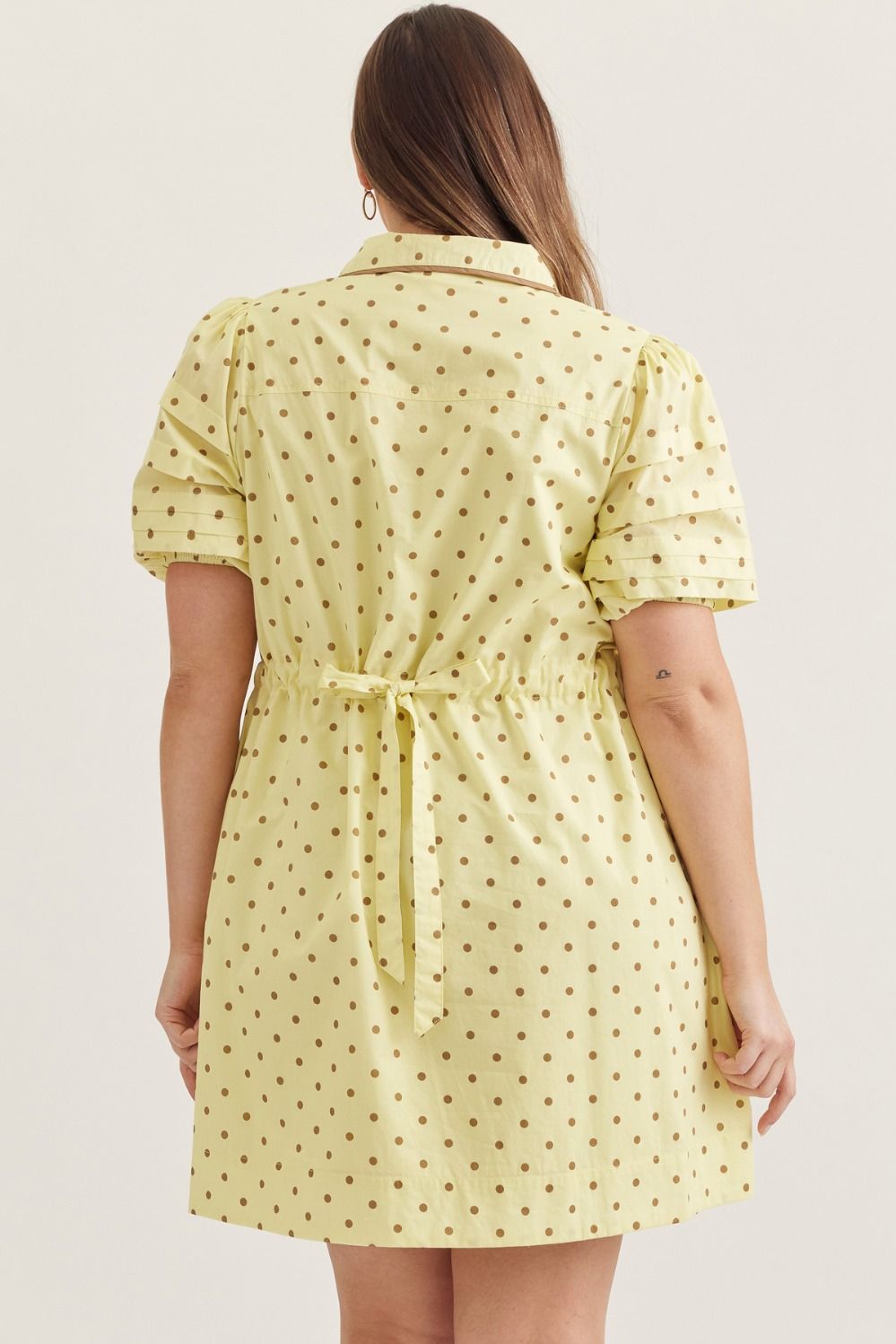 Entro lemon drop yellow plus size dress with brown polka dots, cinch waist and tiered detail at shoulders in back