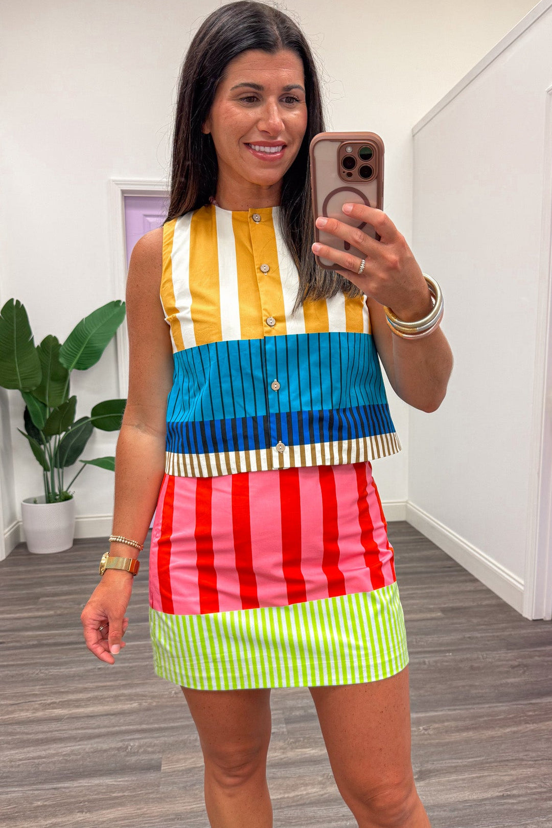 yellow blue teal brown and cream striped button front crew neckline semi-cropped top