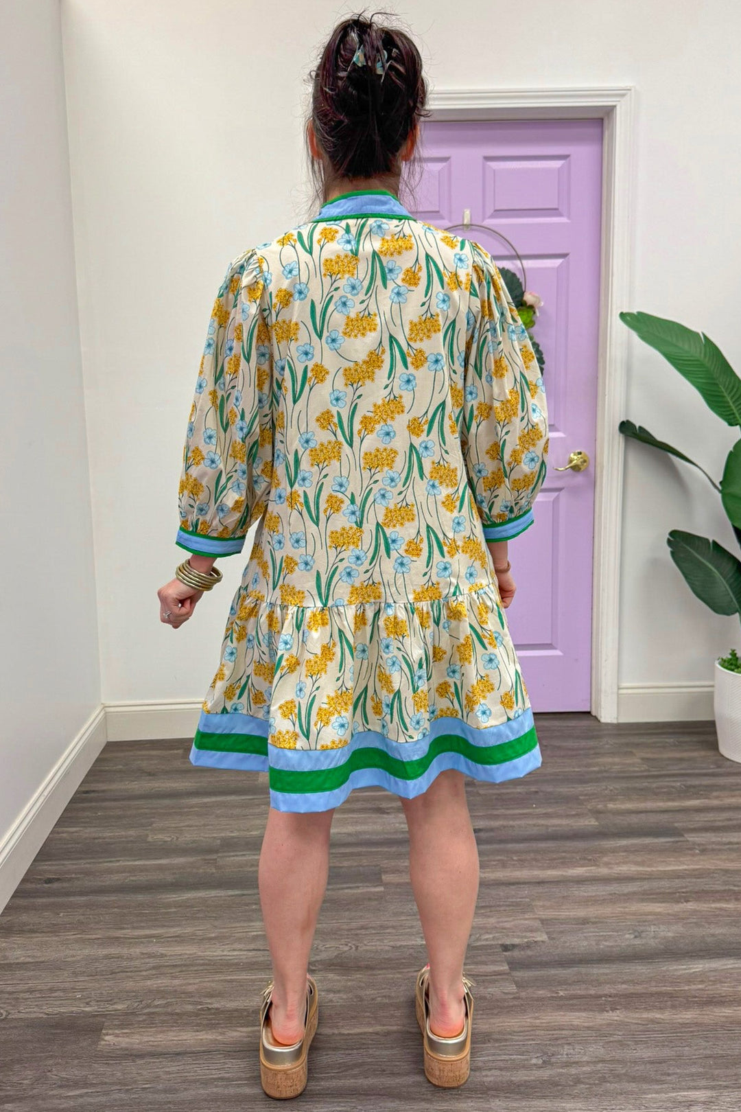 cream yellow floral blue green trim belted poplin dress back view