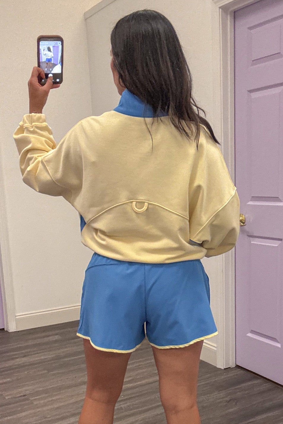 butter yellow with blue colorblock details collared snap bodice long sleeve pullover