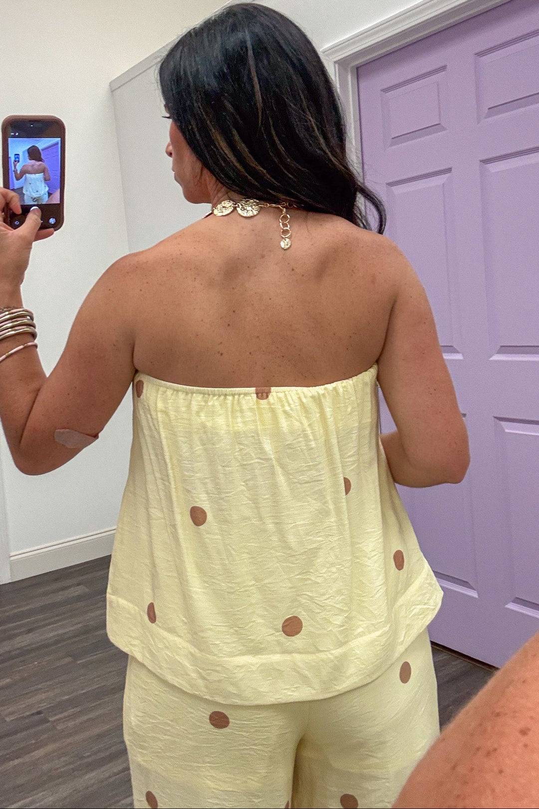 pale yellow with brown polka dot strapless lightweight top back view