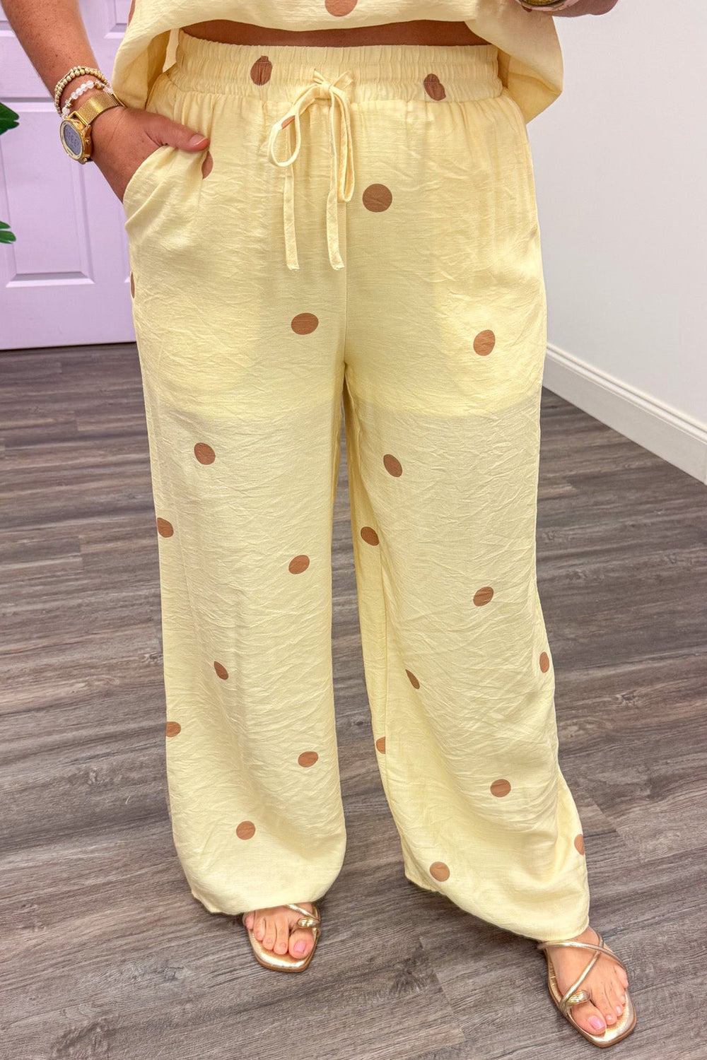 pale yellow with light brown polka dot print wide leg pants with front pockets