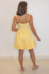 yellow bubble hem mini dress