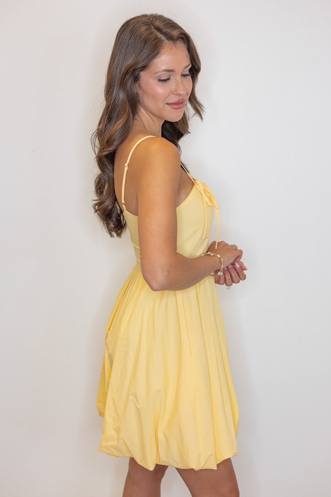 yellow bubble hem mini dress