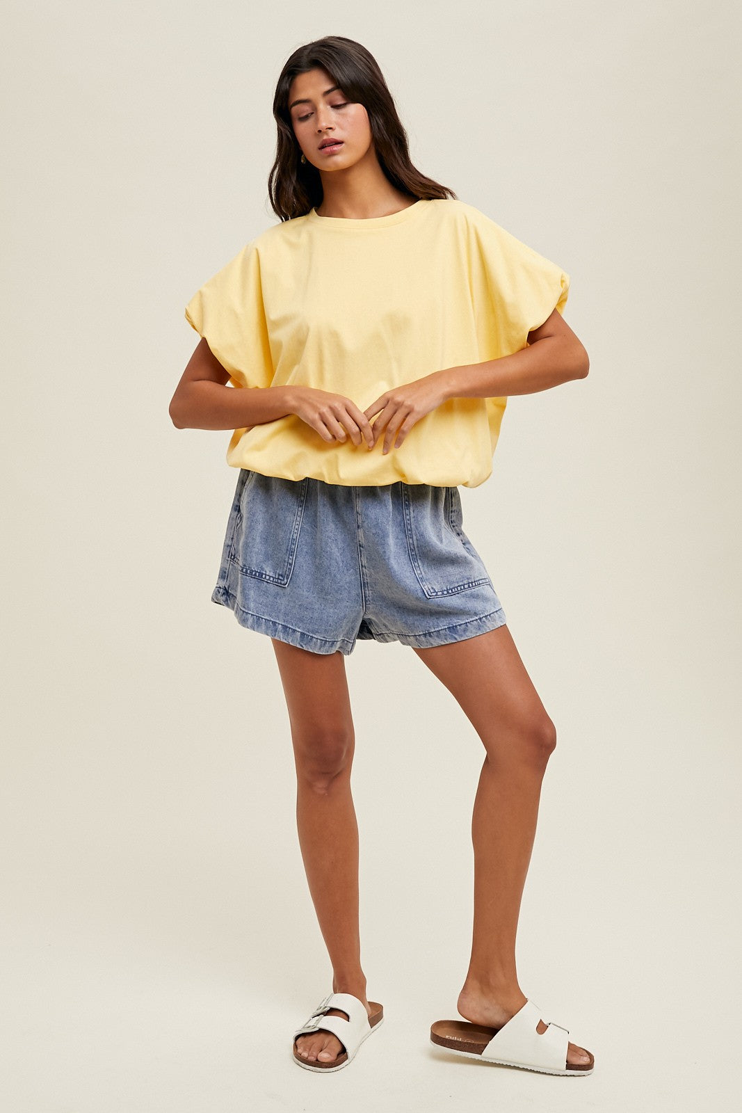Lemon yellow knit semi-cropped top with bubble hem by Wishlist showing full front view