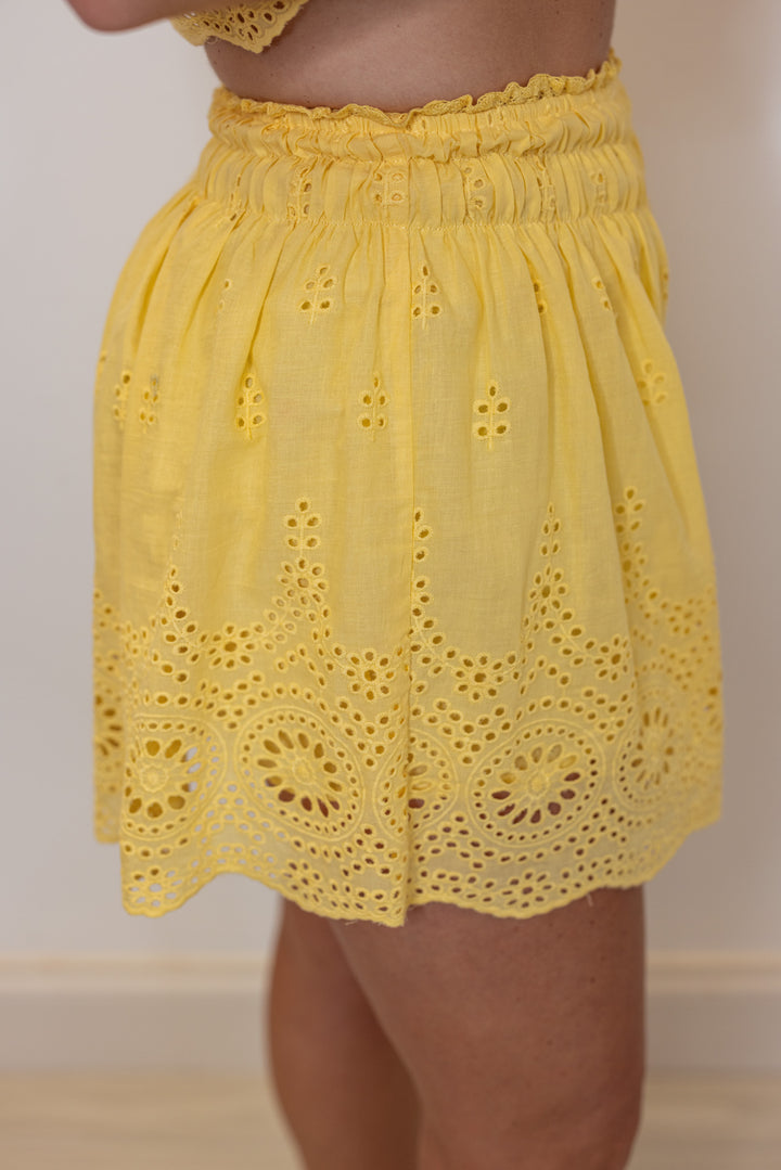 yellow cotton eyelet smocked waist shorts