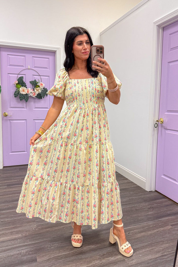Women's flowy and relaxed spring butter yellow floral midi dress