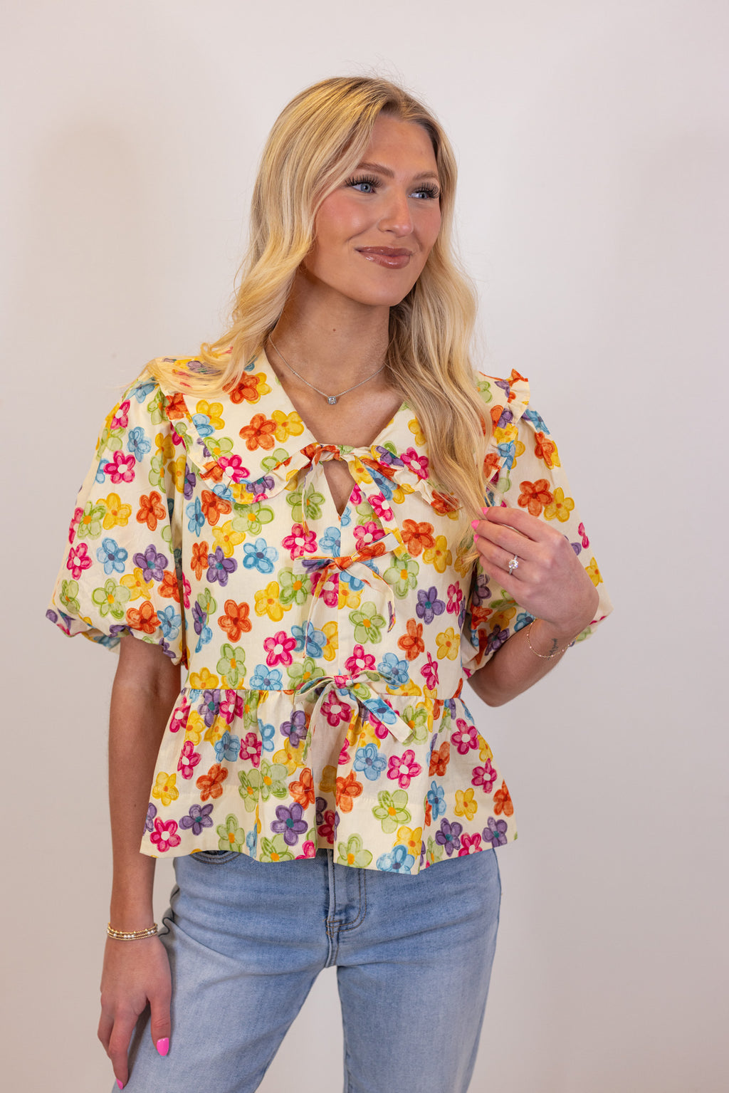 yellow multi color floral peplum tie top