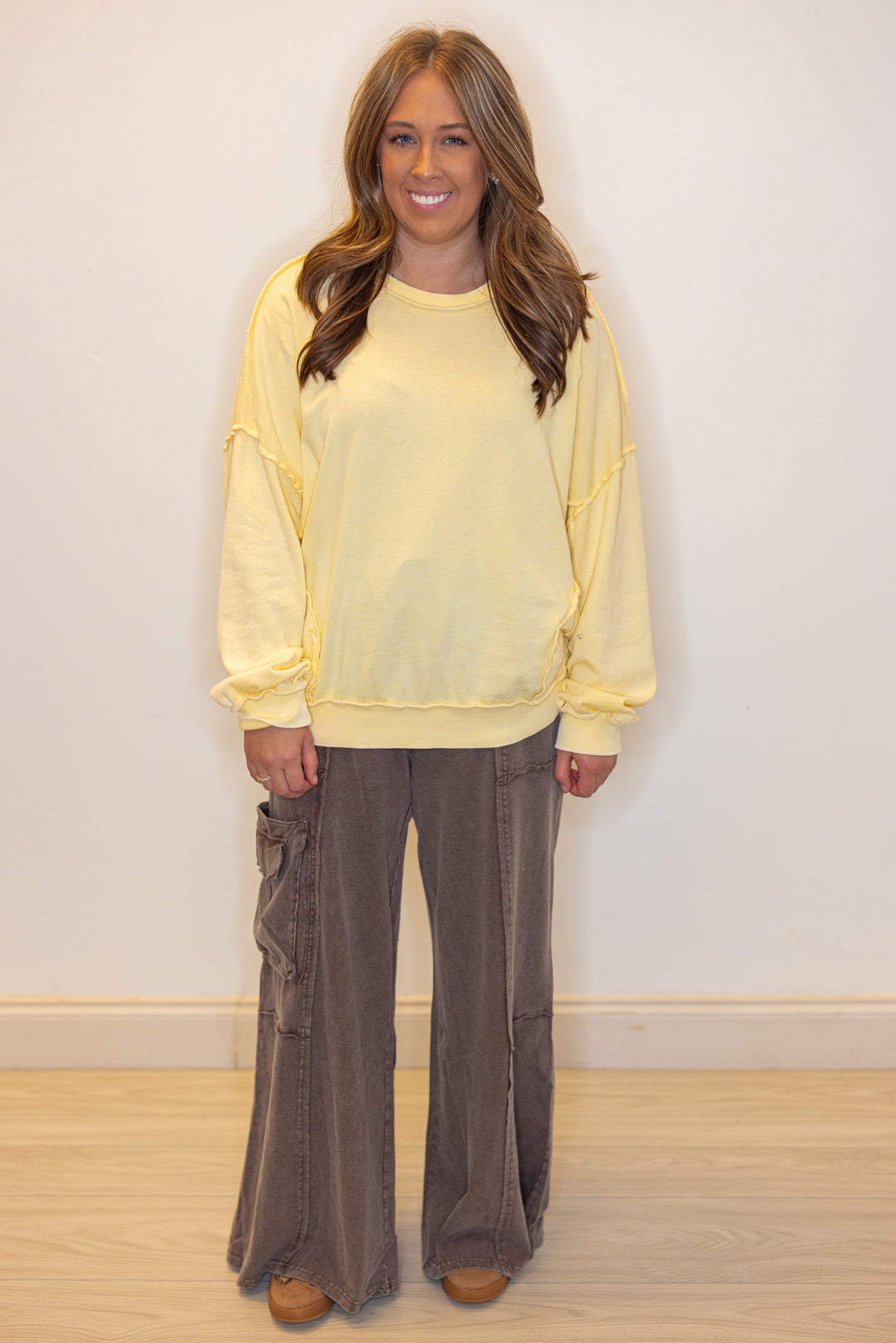 Mineral washed lemon yellow pullover top with front pockets by Easel showing full front view