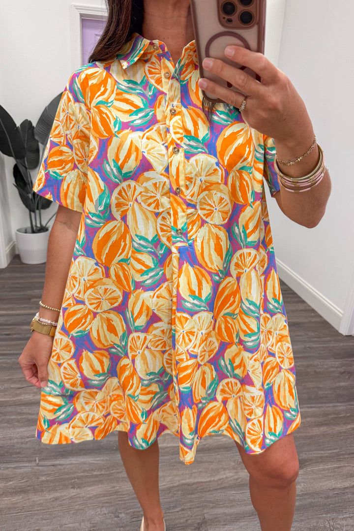 yellow and orange large citrus print button front collared neckline short dress